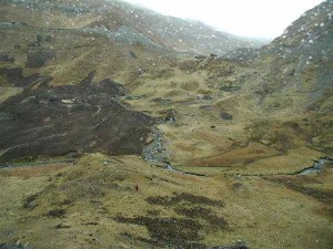 Snow begins to fall as we approach the summit